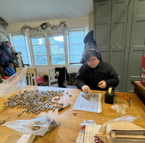 Sorting Donated hearing aids to send to Fletcher in Malawi
