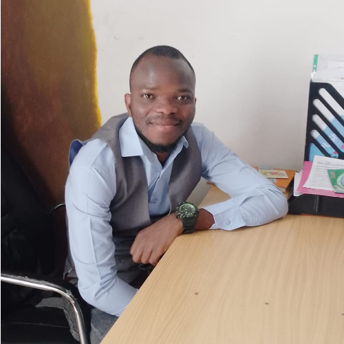 Fletcher Chisalipo in his clinic in Malawi, supported by Hearing Aid Recycling providing donated hearing aids.