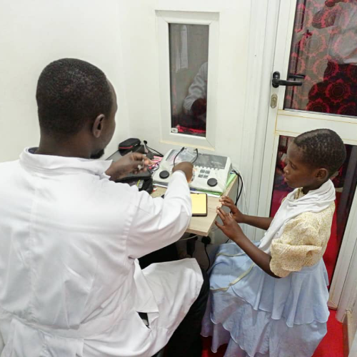 Donated hearing aids UK fitting session in Uganda