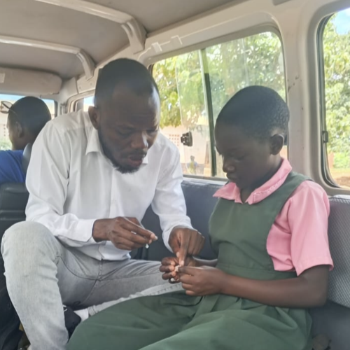 Hearing Aid Recycling outreach projects dispensing hearing aids